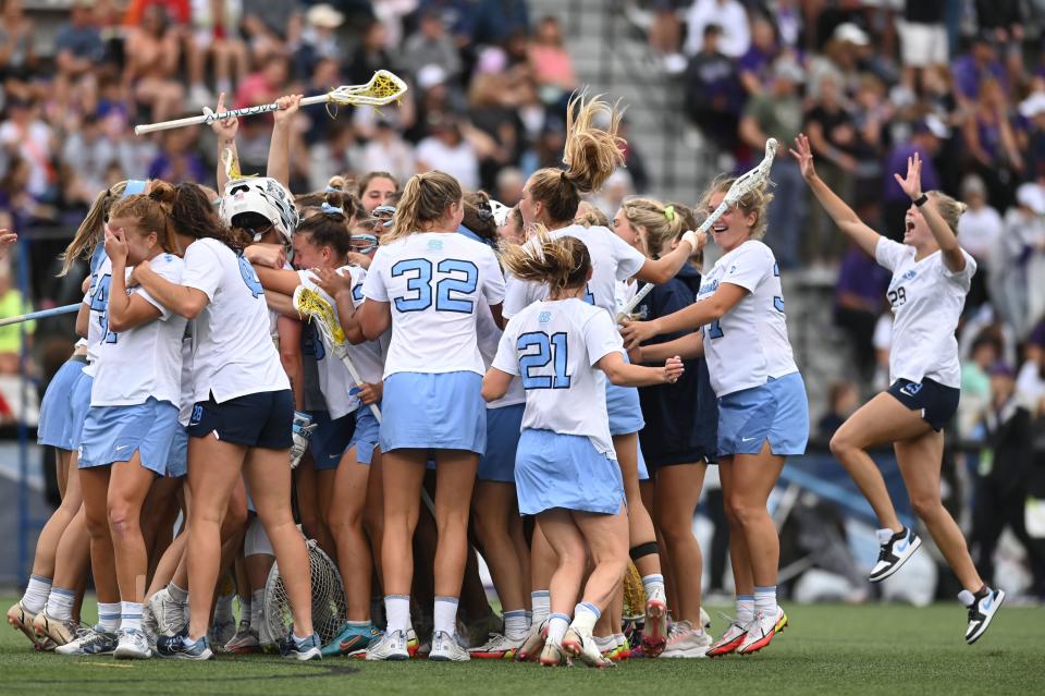 May 27, 2022; Baltimore, MD, USA; North Carolina celebrates on the field after the game against the Northwestern  at Homewood Field. North Carolina defeated Northwestern 15-14 to advance to the national championship. Mandatory Credit: Tommy Gilligan-USA TODAY Sports