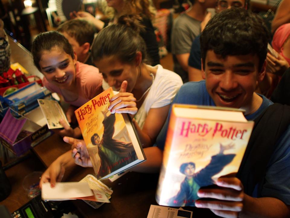 People buy copies of Harry Potter and the Deathly Hallows