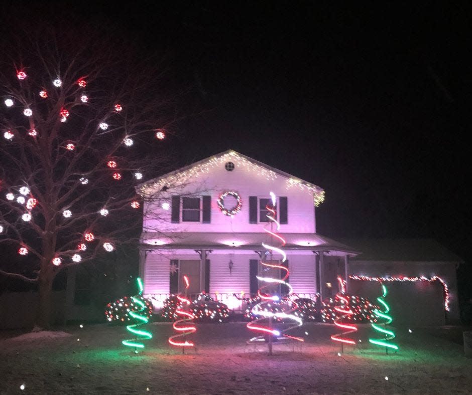 Christmas on Waterfall at 12355 Waterfall Ave. NW in Lake Township has a computer-controlled light show.