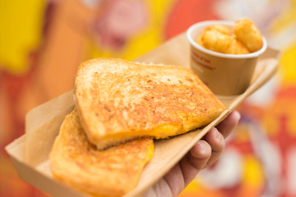 <p>This sandwich — from Woody's Lunch Box at Disney’s Hollywood Studios in Orlando — is extra cheesy and crunchy. The secret? Garlic mayo is spread on the outside instead of butter. </p> <p><strong>Get the recipe <a href="https://disneyparks.disney.go.com/blog/2020/04/cooking-up-the-magic-at-home-celebrate-national-grilled-cheese-day-with-a-grilled-cheese-sandwich-from-toy-story-land/" rel="nofollow noopener" target="_blank" data-ylk="slk:HERE;elm:context_link;itc:0;sec:content-canvas" class="link ">HERE</a></strong></p>