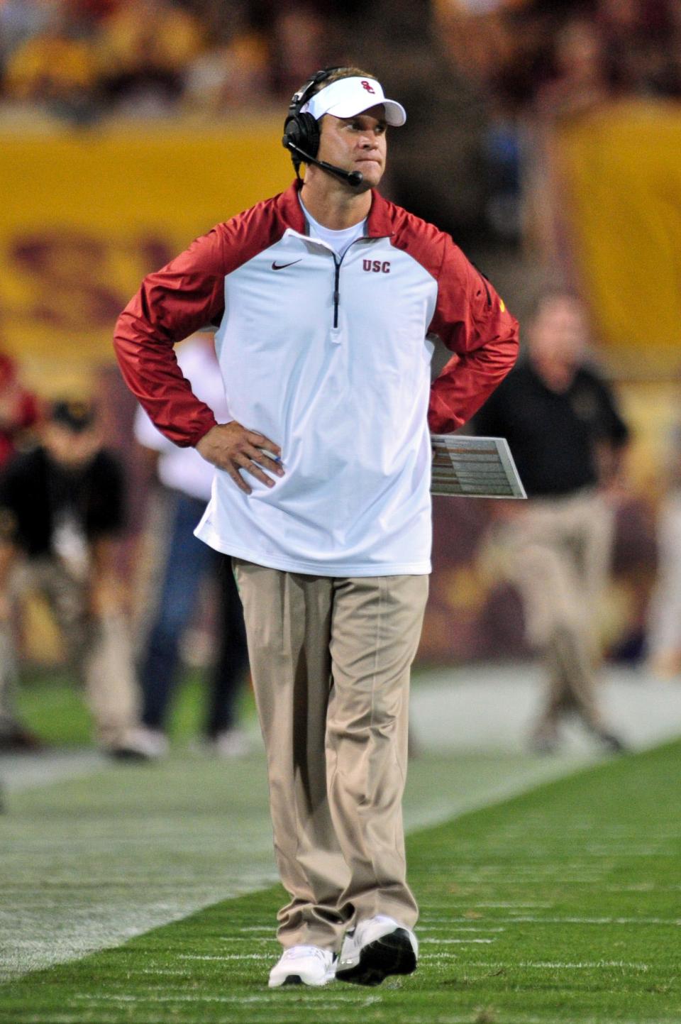 Lane Kiffin stands on the sideline, frustrated during his loss to Arizona State; September 28, 2013