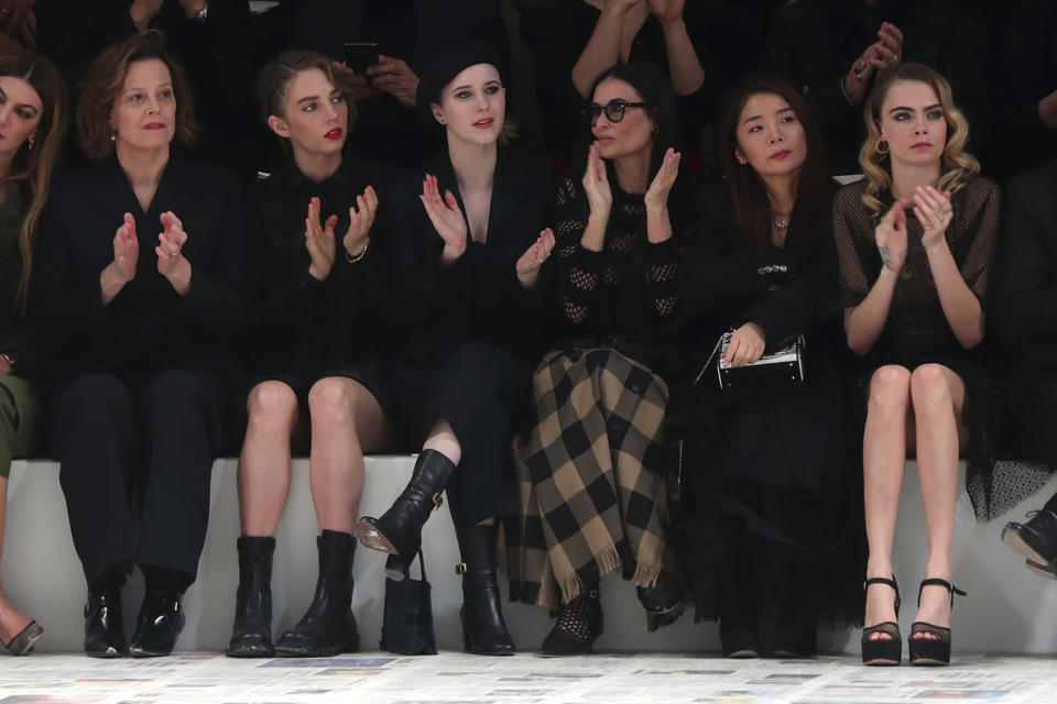 From left, Sigourney Weaver, her daughter Charlotte, Rachel Brosnahan, Demi Moore, and Cara Delevingne applause at the end of the Dior fashion collection during Women's fashion week Fall/Winter 2020/21 presented in Paris, Tuesday, Feb. 25, 2020. (AP Photo/Thibault Camus)