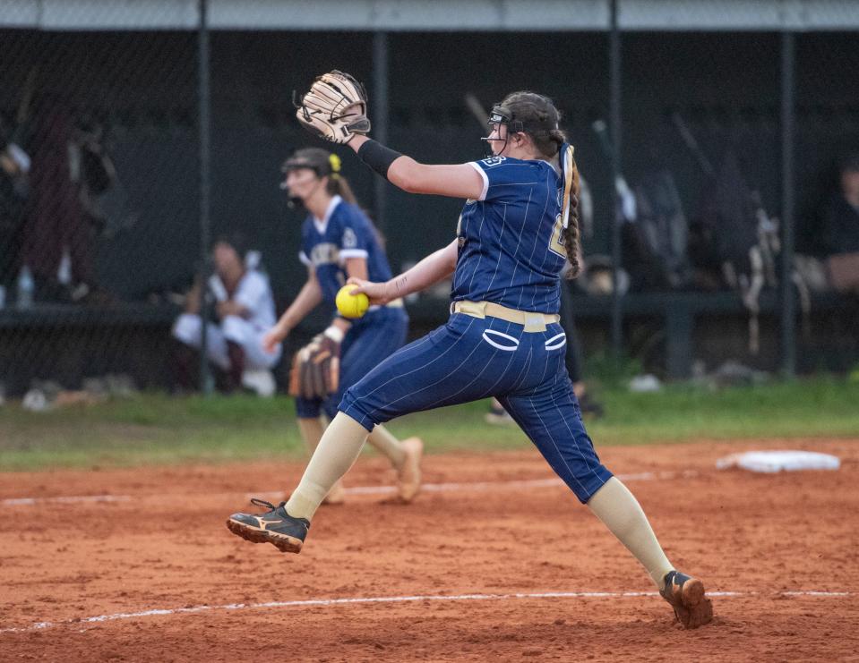 Jacey Reed (2) pitches during the Gulf Breeze vs Navarre softball game at Navarre High School on Tuesday, April 26, 2022.