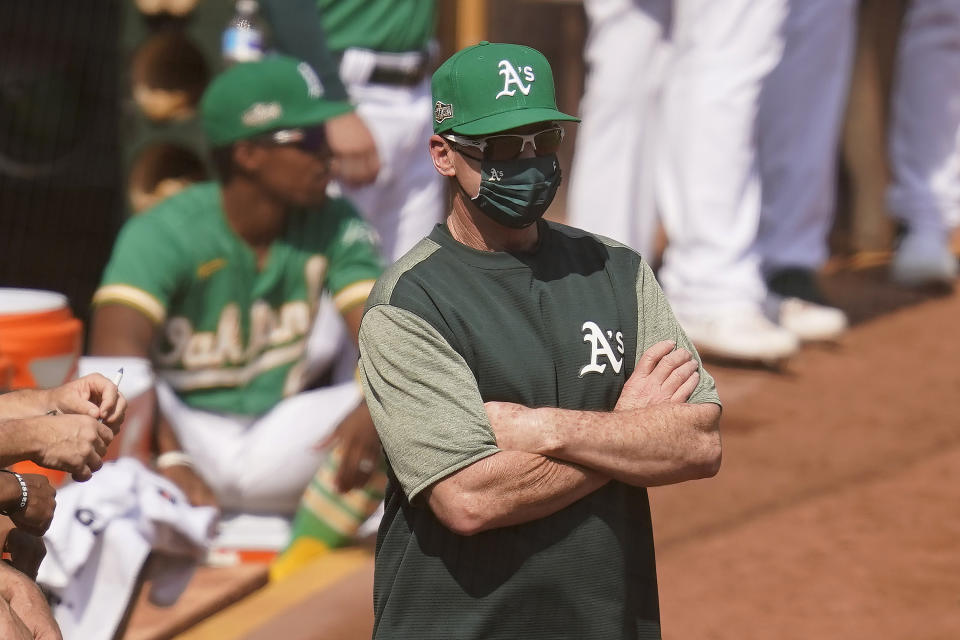 Oakland Athletics manager Bob Melvin watches during the second inning of Game 2 of an American League wild-card baseball series against the Chicago White Sox, Wednesday, Sept. 30, 2020, in Oakland, Calif. (AP Photo/Eric Risberg)