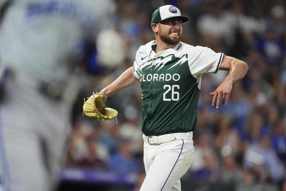 Colorado Rockies starting pitcher Austin Gomber reacts after getting Kansas City Royals' Kyle Isbel to fly out to end the top of the seventh inning of a baseball game Saturday, July 6, 2024, in Denver. (AP Photo/David Zalubowski)