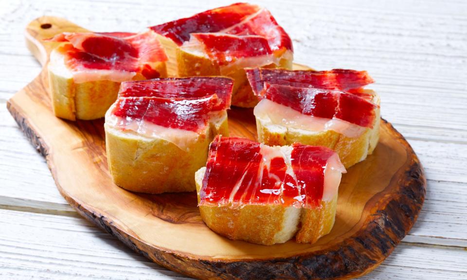 Pinchos are tapas-like snacks typically served in northern Spain, made with things like Iberian ham topping slices of crusty bread.