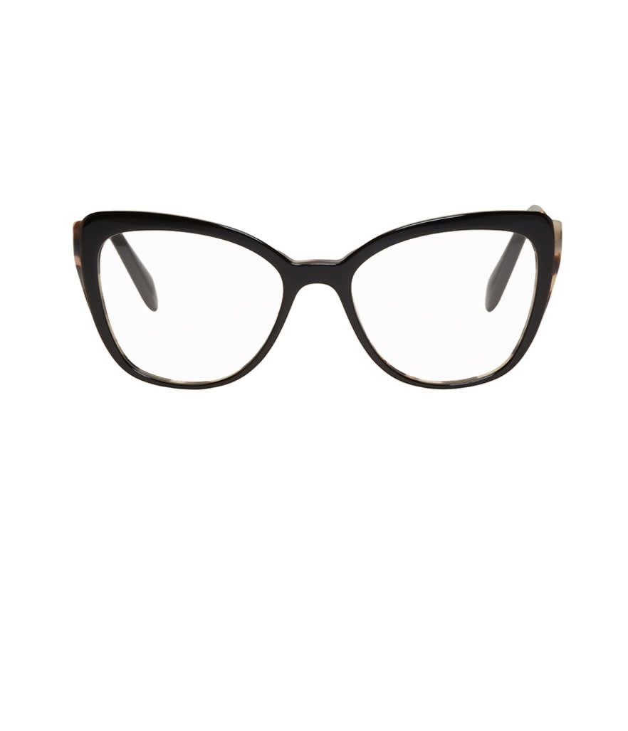 <p>Black and gold cat-eye glasses, $360,<a rel="nofollow noopener" href="https://www.ssense.com/en-us/women/product/miu-miu/black-gold-cat-eye-glasses/2582548?utm_source=2687457_CPC&utm_medium=affiliate&utm_campaign=eyeglasses_nonsale&utm_term=CPC" target="_blank" data-ylk="slk:ssense.com;elm:context_link;itc:0;sec:content-canvas" class="link "> ssense.com</a> </p>