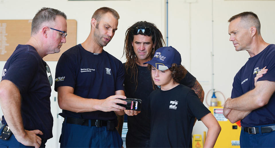 Five months on, Connor was reunited with the emergency workers who helped save his life. Source: RACQ LifeFlight