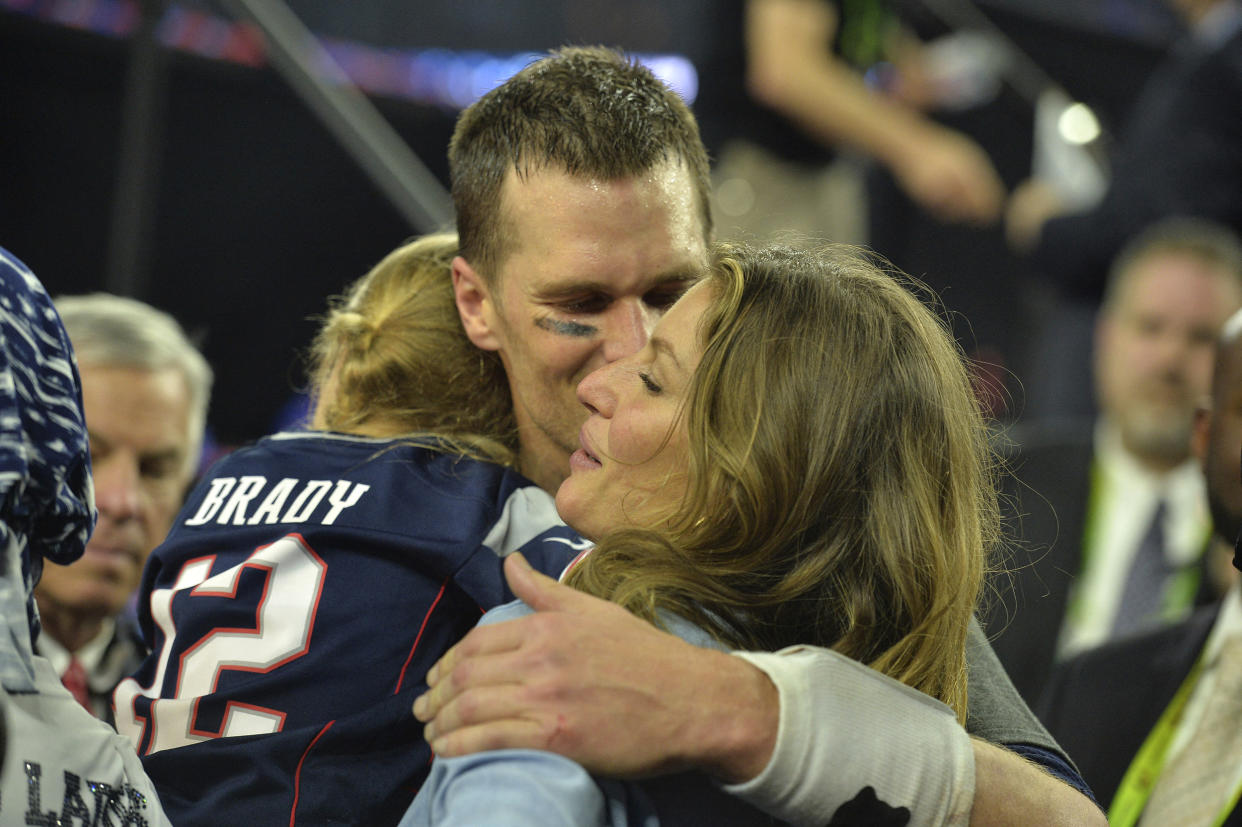 Tom Brady celebrates with his wife Gisele Bundchen after defeating the Falcons at Super Bowl LI at the NRG Stadium in Houston, TX, USA, on Feb. 5, 2017. (Abaca Press / Sipa USA via AP)