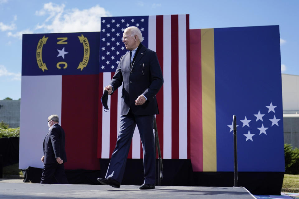 Democratic presidential candidate former Vice President Joe Biden arrives to speak during a campaign event at Riverside High School in Durham, N.C., Sunday, Oct. 18, 2020. (AP Photo/Carolyn Kaster)