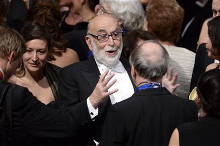 Nobel Prize in Physics laureate Francois Englert of Belgium reacts after the 2013 Nobel Prize award ceremony in Stockholm December 10, 2013. REUTERS/Fredrik Sandberg