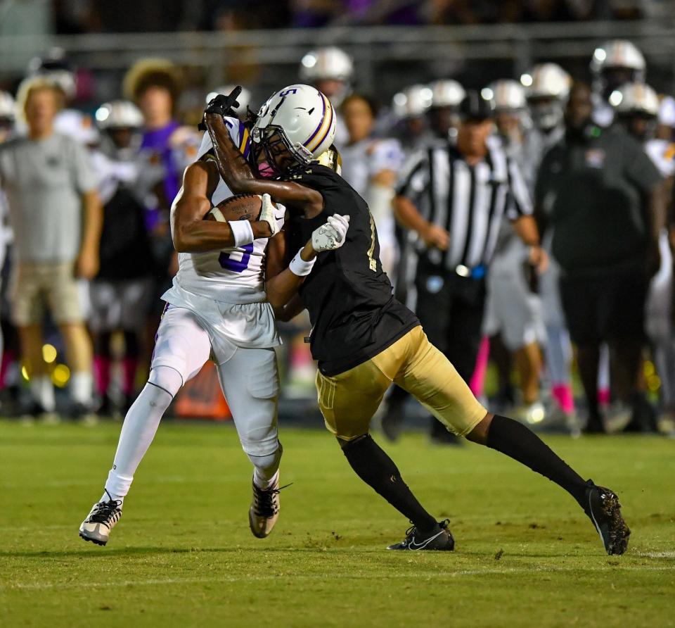 Treasure Coast defensive back Shamir Sterlin (1) makes a tackle in a high school football game against Fort Pierce Central on Friday, Oct. 13, 2023, in Port St. Lucie.