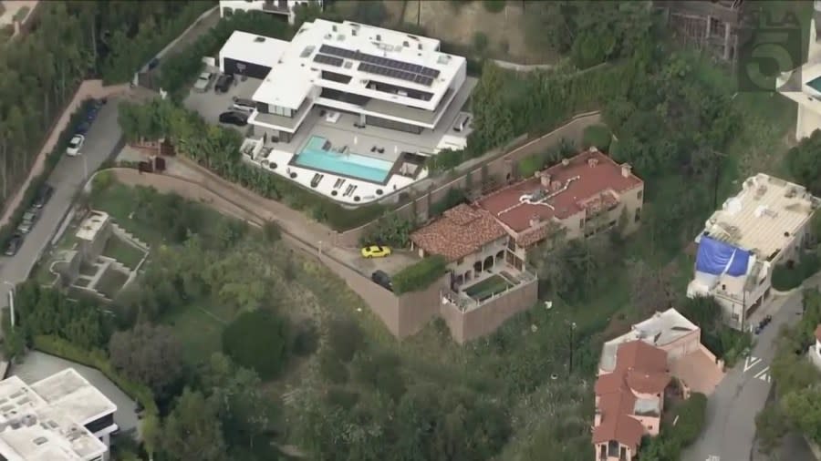 A Beverly Crest mansion taken over by squatters is surrounded by high-profile celebrity neighbors. (KTLA)