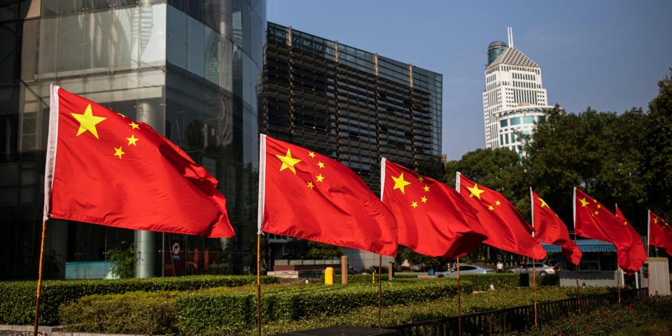 The national flag of China is displayed in a street in Wuhan, Hubei province, China.