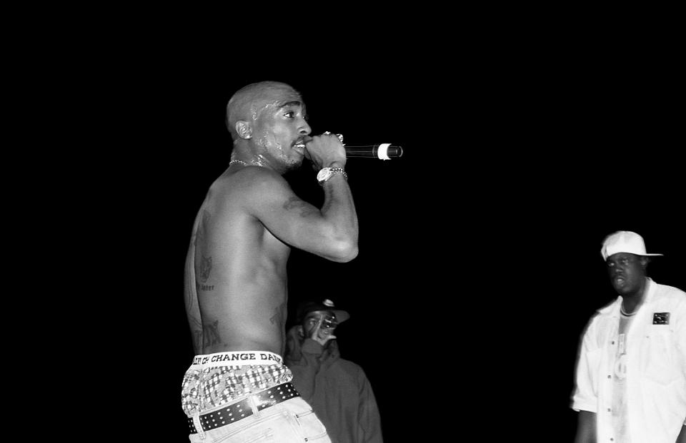 MILWAUKEE - SEPTEMBER 1994:  Rapper Tupac Shakur performs at the Mecca Arena in Milwaukee, Wisconsin in September 1994.  (Photo By Raymond Boyd/Getty Images)  