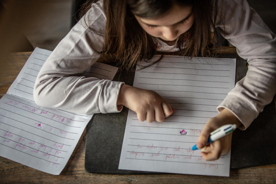 Cursive writing has been known to improve fine motor skills and cognitive development. (Photo via Getty Images)