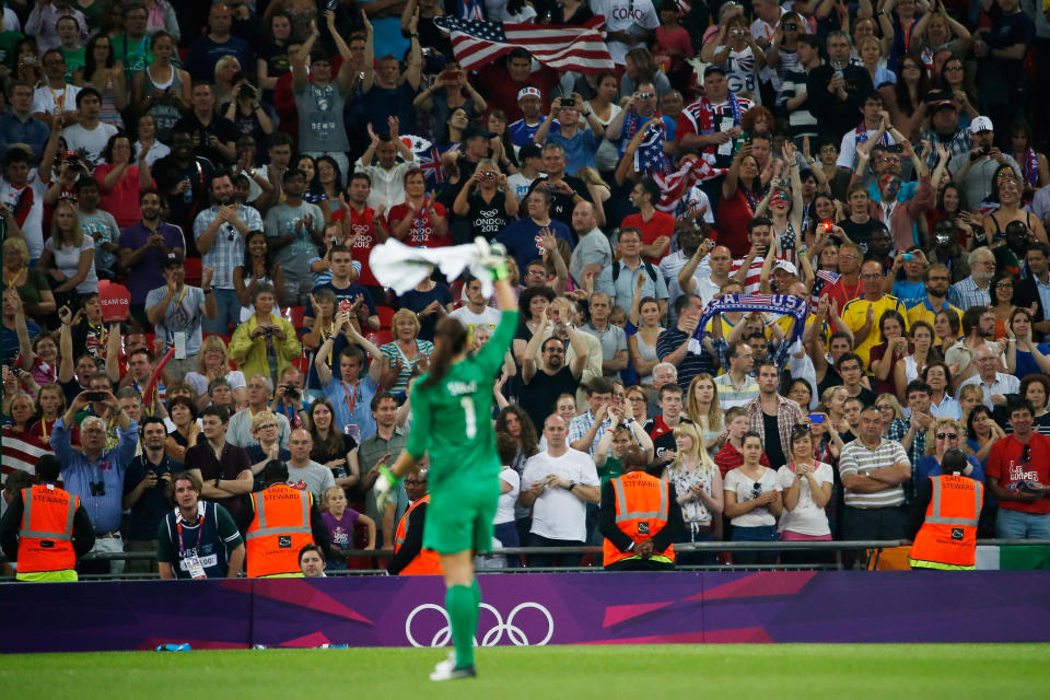 LONDON, ENGLAND - AUGUST 09: Hope Solo #1 of the United States celebrates after defeating Japan by a score of 2-1 to win the Women's Football gold medal match on Day 13 of the London 2012 Olympic Games at Wembley Stadium on August 9, 2012 in London, England. (Photo by Jamie Squire/Getty Images)