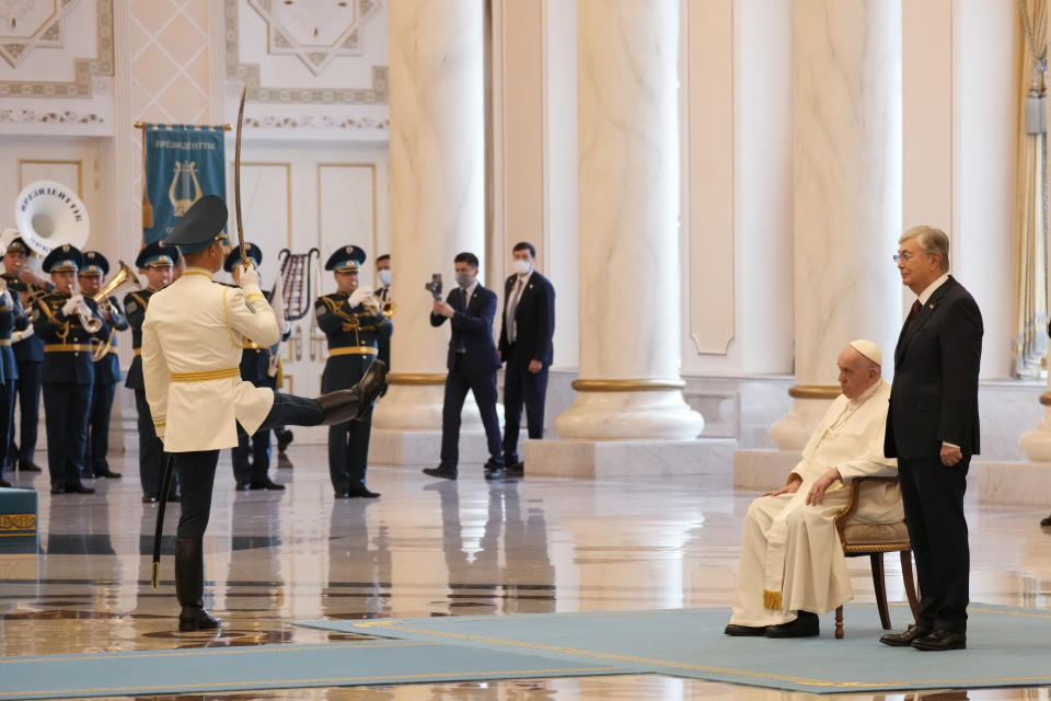 Pope Francis attends with Kazakhstan's President Kassym-Jomart Tokayev the welcome ceremony at the Presidential Palace Ak Orda, in Nur-Sultan, Kazakhstan, Tuesday, Sept. 13, 2022. Pope Francis begins a 3-days visit to the majority-Muslim former Soviet republic to minister to its tiny Catholic community and participate in a Kazakh-sponsored conference of world religious leaders. (AP Photo/Andrew Medichini)