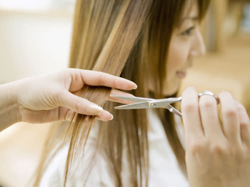 <div class="caption-credit"> Photo by: Michael Hitoshi/Getty</div><div class="caption-title">Crossing your legs during a cut</div>It may be tempting to read a magazine at the salon, but it's important to keep from hunching forward. Be sure to leave your limbs uncrossed, and keep your head still in order to get the most accurate, precise cut. <br> <br> <b>More from REDBOOK: <br></b> <ul> <li> <b><a rel="nofollow noopener" href="http://www.redbookmag.com/beauty-fashion/tips-advice/best-at-home-hair-color?link=rel&dom=yah_life&src=syn&con=blog_redbook&mag=rbk" target="_blank" data-ylk="slk:Best At-Home Hair Color Trends;elm:context_link;itc:0;sec:content-canvas" class="link ">Best At-Home Hair Color Trends</a></b> </li> <li> <b><a rel="nofollow noopener" href="http://www.redbookmag.com/beauty-fashion/tiptool/how-to-look-younger#/category1?link=rel&dom=yah_life&src=syn&con=blog_redbook&mag=rbk" target="_blank" data-ylk="slk:43 Sneaky Tricks to Look Younger;elm:context_link;itc:0;sec:content-canvas" class="link ">43 Sneaky Tricks to Look Younger</a></b> </li> </ul>