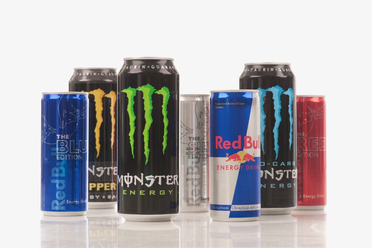 Monster and Red Bull energy drinks in cans