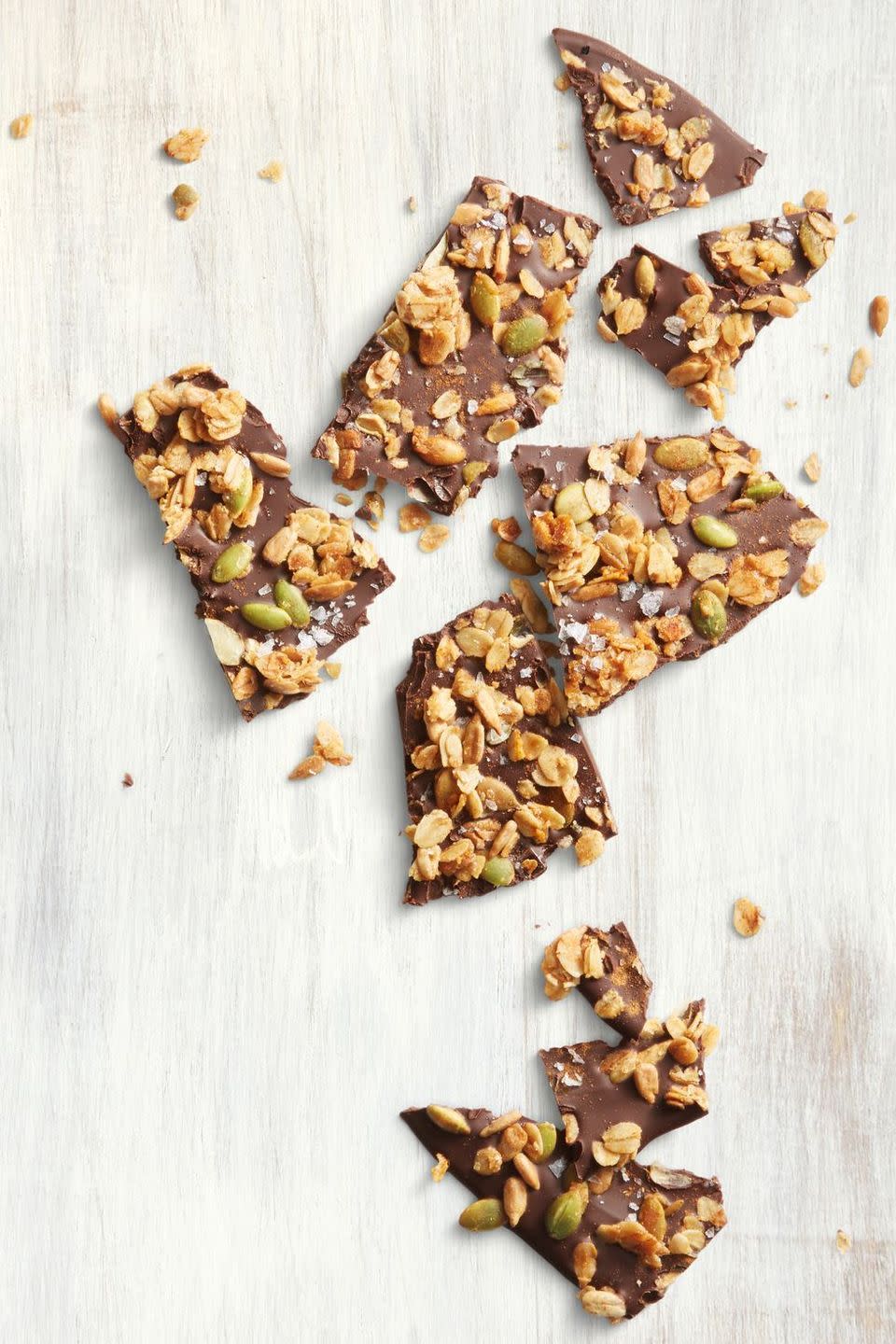 <p>We sprinkled decadent dark chocolate with a sweet and spicy pumpkin seed granola, making this crunchy fall sweet basically healthy, right?<br></p><p><em><a href="https://www.goodhousekeeping.com/food-recipes/dessert/a22750665/aztec-chocolate-granola-bark-recipe/" rel="nofollow noopener" target="_blank" data-ylk="slk:Get the recipe for Aztec Chocolate Granola Bark »;elm:context_link;itc:0;sec:content-canvas" class="link ">Get the recipe for Aztec Chocolate Granola Bark »</a></em> </p>