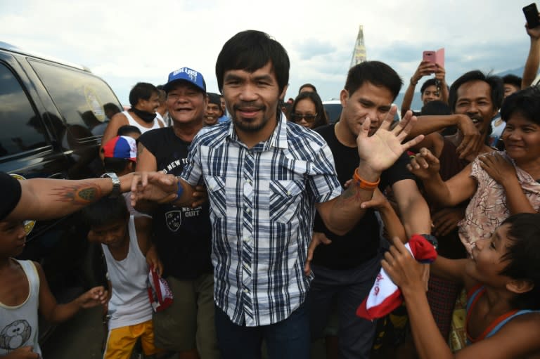 Surveys show Pacquiao is virtually guaranteed to win a Senate seat and his journey through shanty towns near Manila, where he threw caps and other souvenirs to joyous fans holding life-sized posters of him, appeared more a victory lap than an effort to convince sceptical voters