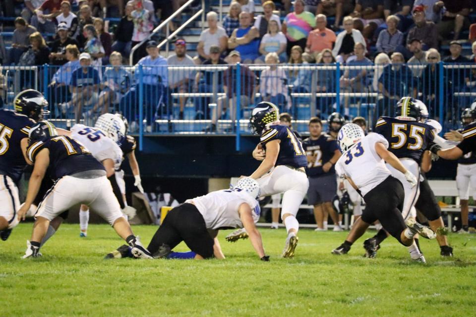 River Valley quarterback Cayden Shidone runs the ball against Ontario.