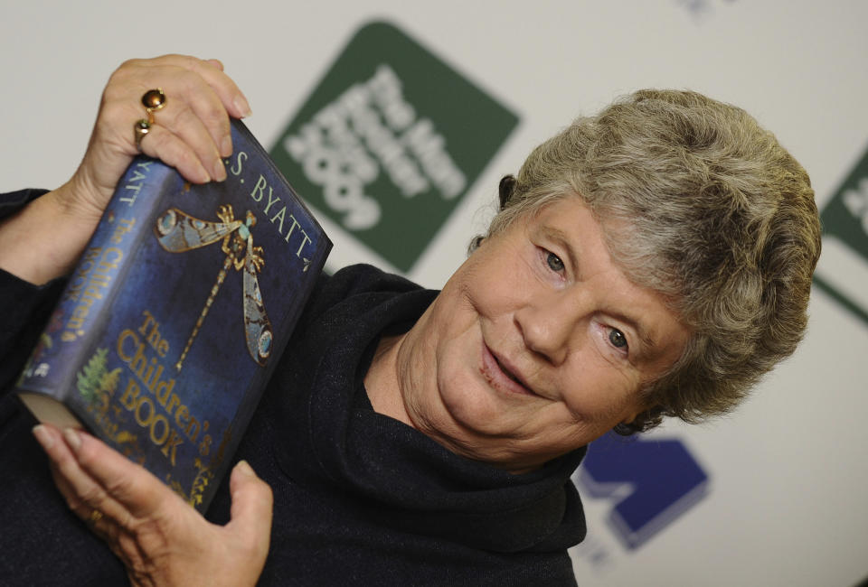 AS Byatt poses when she was shortlisted for the Man Booker Prize, with her book, The Children's Book, at Hatchards bookstore in London on Oct. 5, 2009. Author A.S. Byatt, whose books include the Booker Prize-winning novel “Possession,” has died at the age of 87. Byatt’s publisher, Chatto & Windus, says that the author died “peacefully at home surrounded by close family.” Byatt wrote two dozen novels, starting with “The Shadow of the Sun” in 1964. “Possession,” published in 1990, follows two modern-day academics investigating the lives of a pair of Victorian poets. (Ian West/PA via AP)