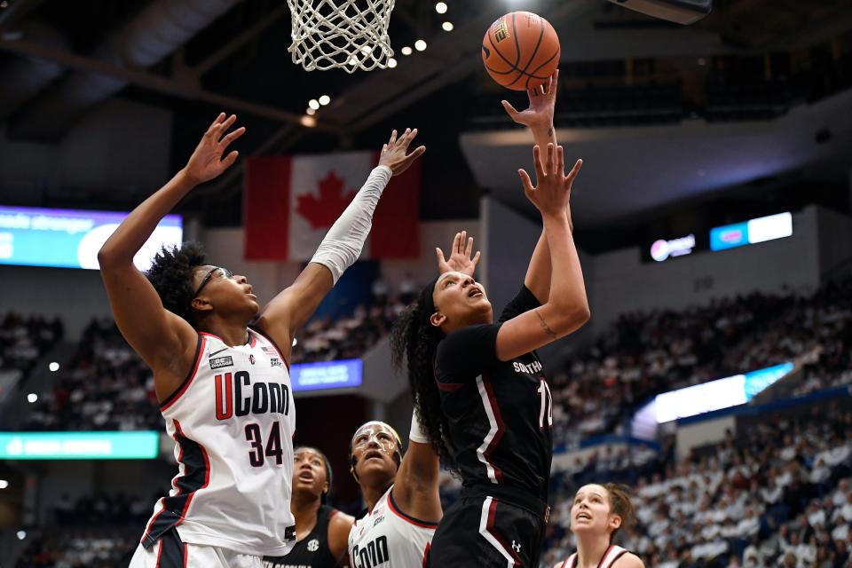 South Carolina's Kamilla Cardoso shoots over UConn's Ayanna Patterson (34) in the second half of an NCAA college basketball game, Sunday, Feb. 5, 2023, in Hartford, Conn.