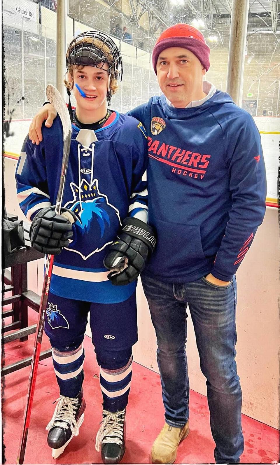 Harper Lawson, right, with his some Wyatt at a hockey tournament.