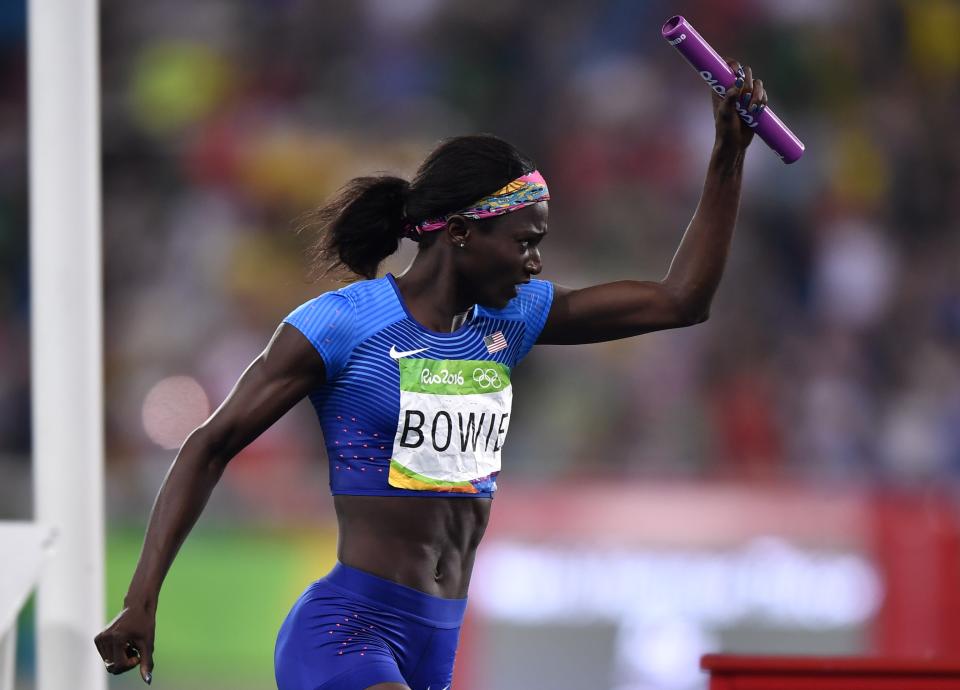 USA's Tori Bowie celebrates her team's victtory in the Women's 4x100m Relay Final during the athletics event at the Rio 2016 Olympic Games at the Olympic Stadium in Rio de Janeiro on August 19, 2016. / AFP / Fabrice COFFRINI (Photo credit should read FABRICE COFFRINI/AFP via Getty Images)