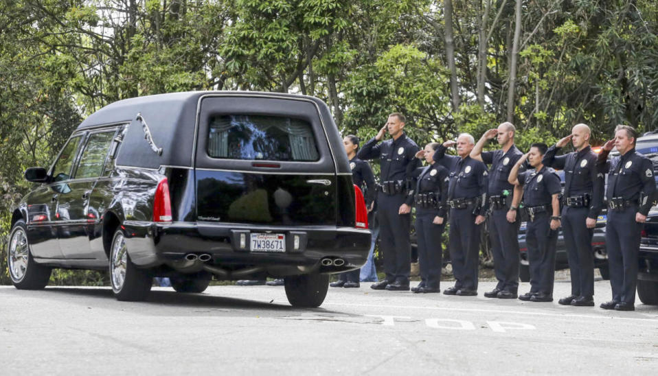 Los Angeles police officers salute