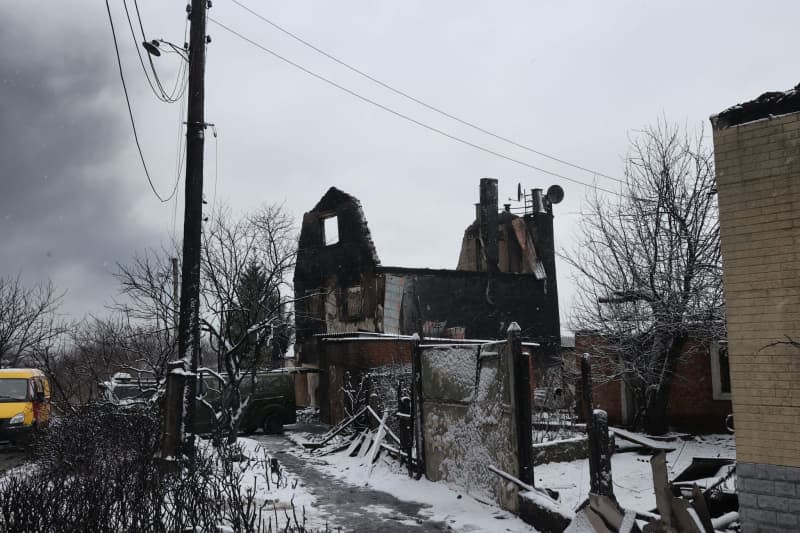 A view of a house that caught fire as a result of the Russian drone attack on an oil depot is seen in the Nemyshlianskyi district. -/Ukrinform/dpa