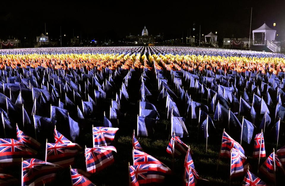 The "Field of Flags" is pictured on the National Mall as the Capitol building is prepared for the inauguration ceremonies. (Photo: TIMOTHY A. CLARY via Getty Images)