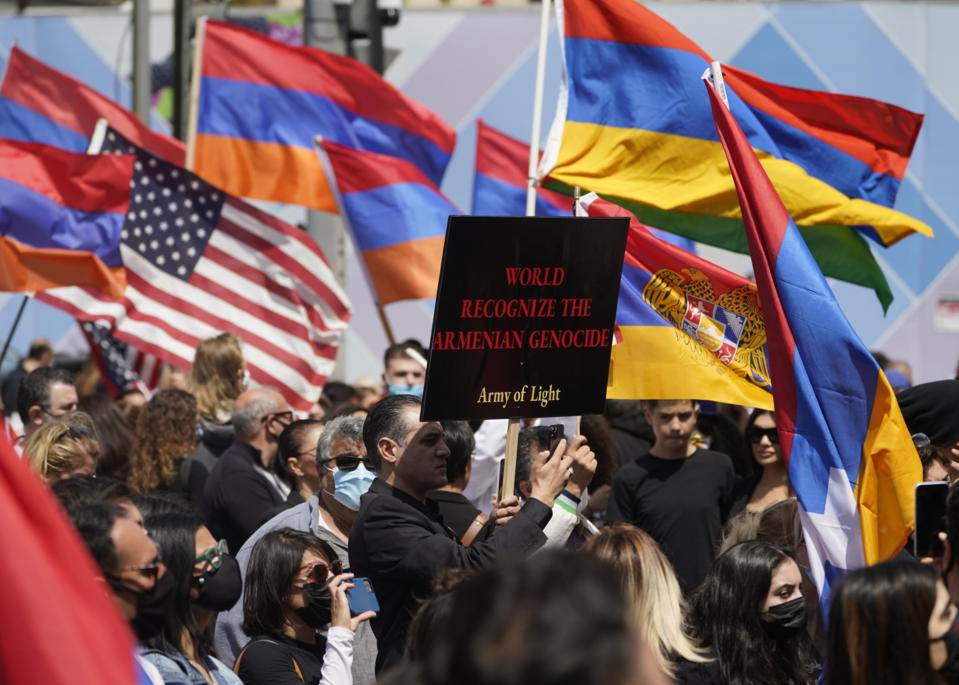 Armemian-Americans hold a rally protesting against the Armenian genocide in Beverly Hills, Calif., Saturday, April 24, 2021. The systematic killing and deportation of more than a million Armenians by Ottoman Empire forces in the early 20th century was "genocide," the United States formally declared on Saturday, as President Joe Biden used that precise word after the White House had avoided it for decades for fear of alienating ally Turkey. (AP Photo/Damian Dovarganes)