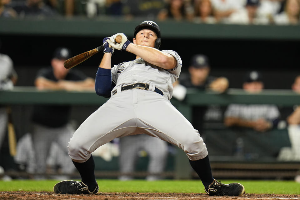 New York Yankees' DJ LeMahieu leans back as a pitch from Baltimore Orioles relief pitcher Bryan Baker comes in tight during the sixth inning of a baseball game, Saturday, July 29, 2023, in Baltimore. (AP Photo/Julio Cortez)
