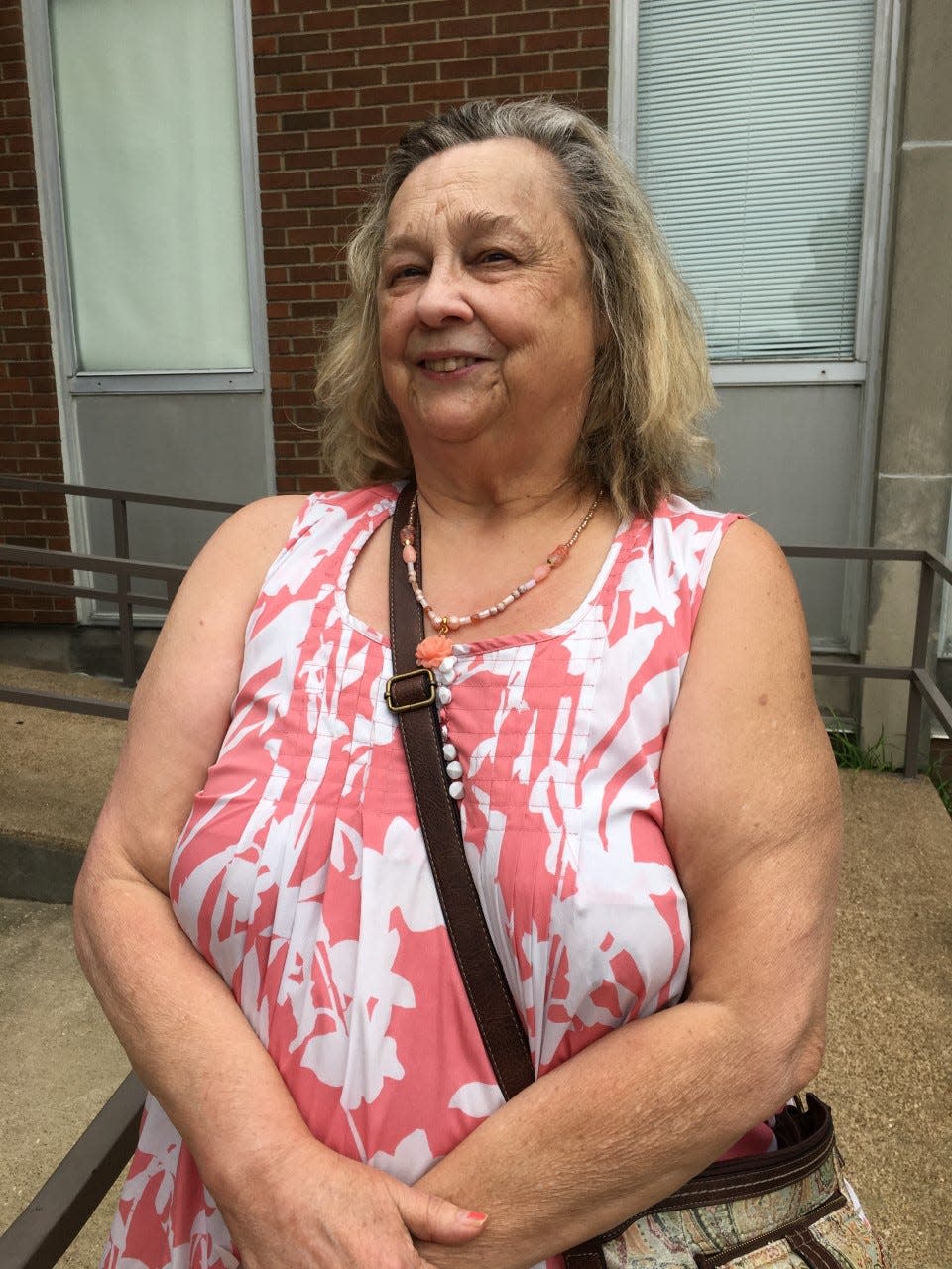 August 4, 2022 - Kathy Sanders, 68, poses for a portrait outside the Shelby County Board of Education polling place.