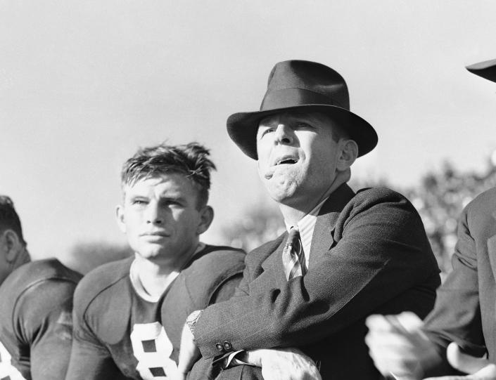 <p>1952 — TCU coach Dutch Meyer publishes the book, “Spread Formation Football.” Meyer only moderately spread the field, utilizing wingbacks instead of running backs, but he also dabbled with a no-huddle attack and shotgun formation. (Photo credit: AP) </p>