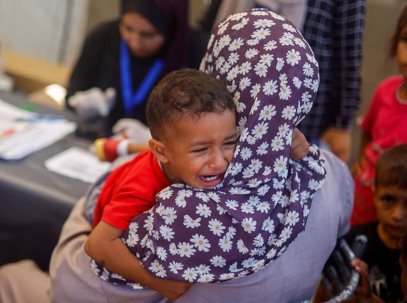 Malnourished Palestinian children receive treatment at the IMC field hospital in Deir Al-Balah, central Gaza Strip