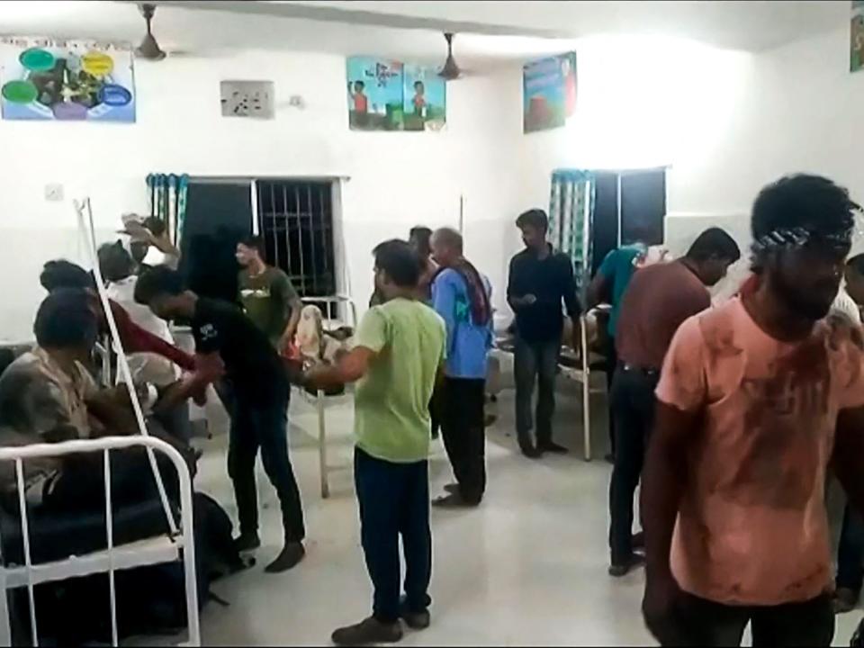 This frame grab taken from an AFPTV video footage on June 3, 2023 shows injured survivors receiving treatment at the Bhadrak District Hospital after a horrific three-train collision that took place near Balasore.