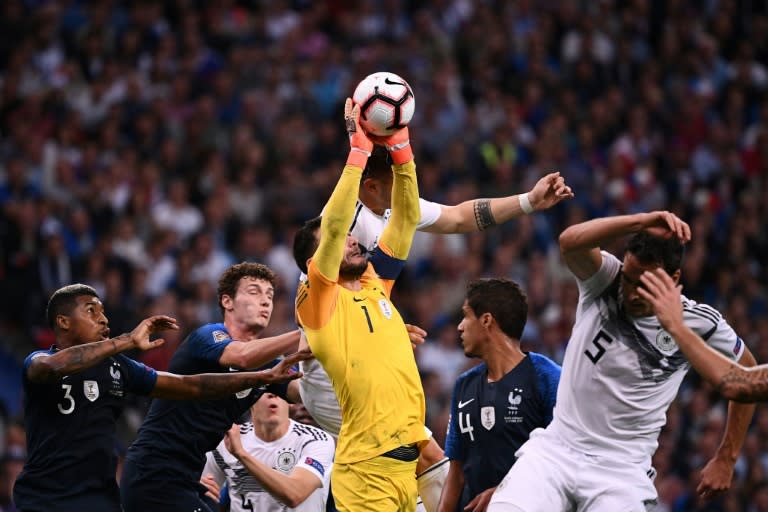 France goalkeeper Hugo Lloris (C) comes to the rescue in a 2-1 Nations League win over Germany he put down to their 'mental strength'