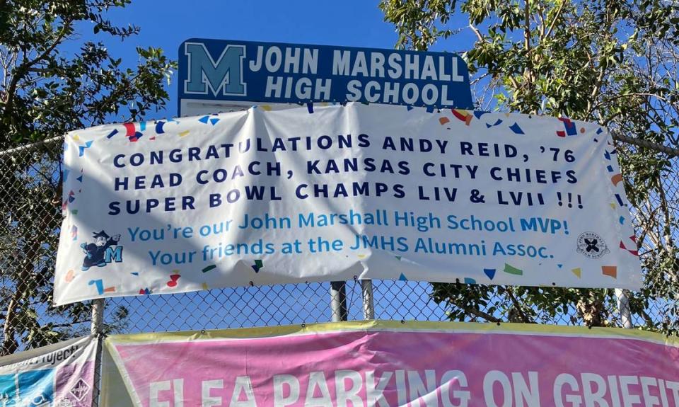 The middle banner hangs outside John Marshall High School, Chiefs coach Andy Reid’s alma mater in Los Angeles.