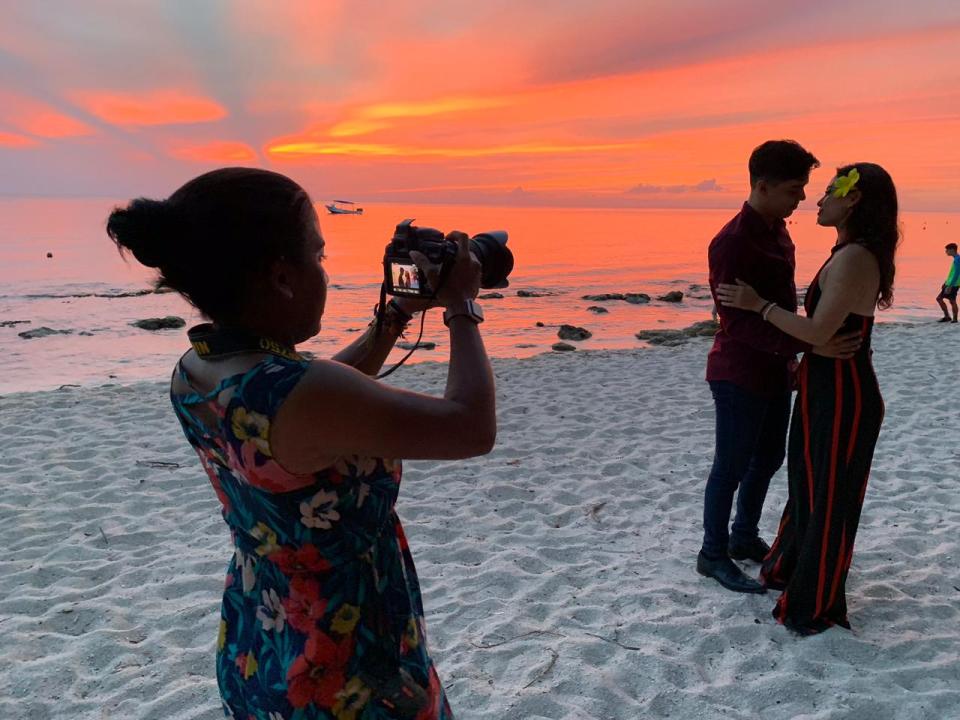 Cruise ship photographer and videographer Nataly Vargas said her favorite part of her job is making lasting memories for guests.