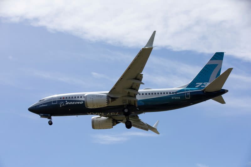 FILE PHOTO: A Boeing 737 MAX airplane lands after a test flight at Boeing Field in Seattle