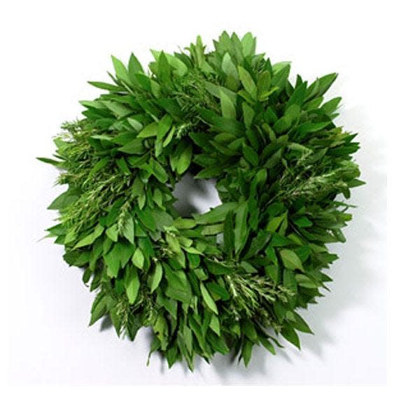 A wreath made with brilliant green bay laurel leaves or fragrant sprigs of rosemary adds style to your holiday decor. They also provide a delightful aroma. (Pinterest)