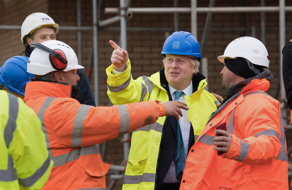 Prime Minister Boris Johnson (2nd right) during a visit to David Wilson Homes in Bedford while on the campaign trail for the General Election.