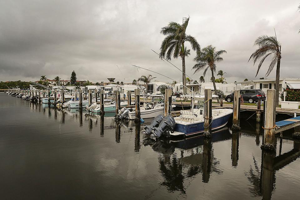 2013: Boats anchored in canal behind mobile homes inside the Briny Breezes community.
