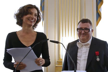 French Culture minister Audrey Azoulay (L) awards fashion designer Alber Elbaz with the Officier de la Legion d'Honneur (Officer of the Legion of Honour) medal during a ceremony at the Culture Ministry in Paris, France, October 3, 2016. REUTERS/Jacky Naegelen