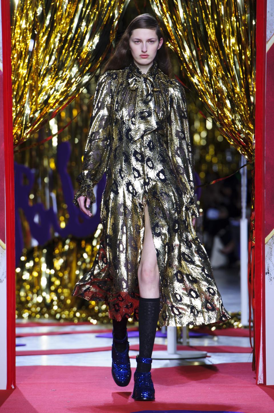 A model wears a design created by Meadham Kirchhoff during London Fashion Week Autumn/Winter 2014, at the Tate Modern in central London, Tuesday, Feb. 18, 2014. (Photo by Jonathan Short/Invision/AP)