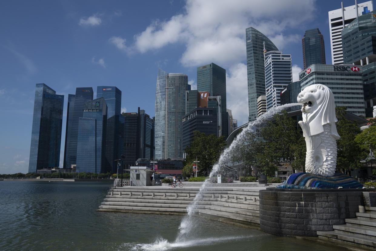 The Merlion Park waterfront stands empty in Singapore, on Tuesday, March 24, 2020. Photographer: Wei Leng Tay/Bloomberg